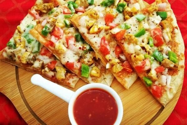 Watch this popular pizza paratha recipe that doesn't require an oven